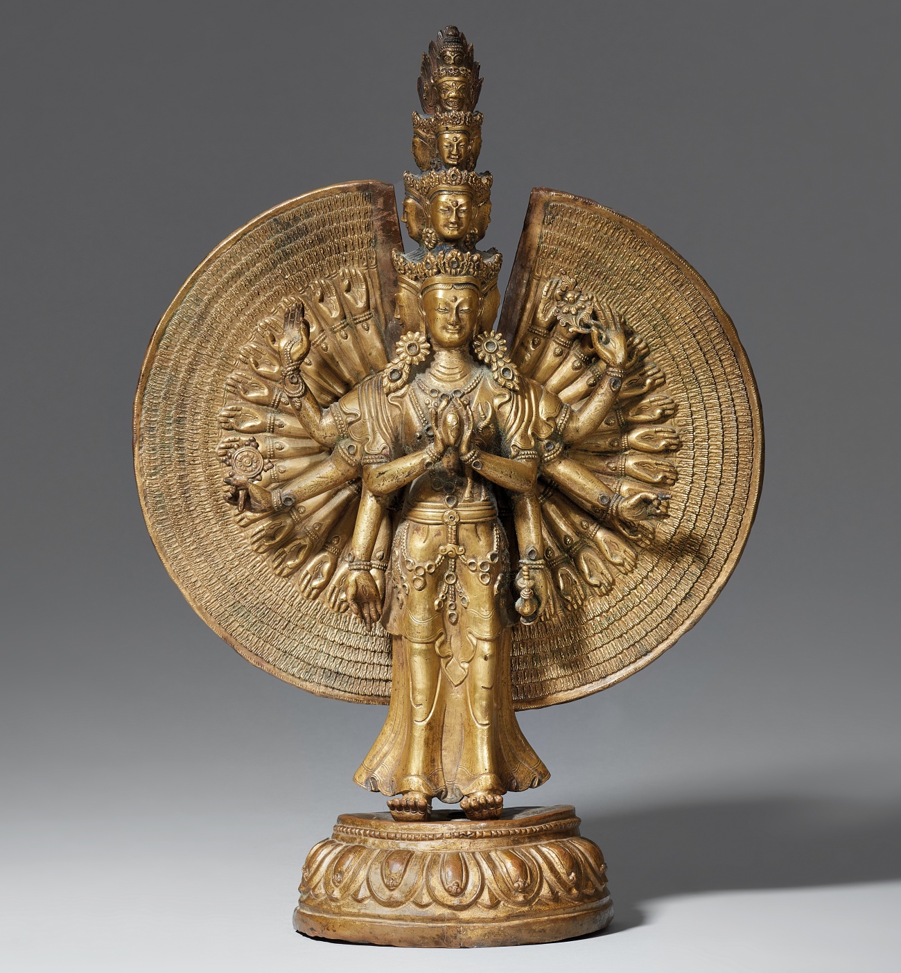 Lempertz-1166-85-Asian-Art-A-Tibetochinese-gilt-bronze-figure-of-the-eleven-headed-Avalokiteshvara-18th-19th-century